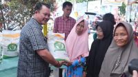 Plt. Wali Kota Gunungsitoli Sowa’a Laoli SE, M.Si Menghadiri Penyerahan Bantuan Beras CPP Kepada Masyarakat Kota Gunungsitoli
