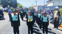 Meriahkan HUT RI Ke-79 SDN 1 Bengkak Ikuti Lomba Gerak Jalan Desa.